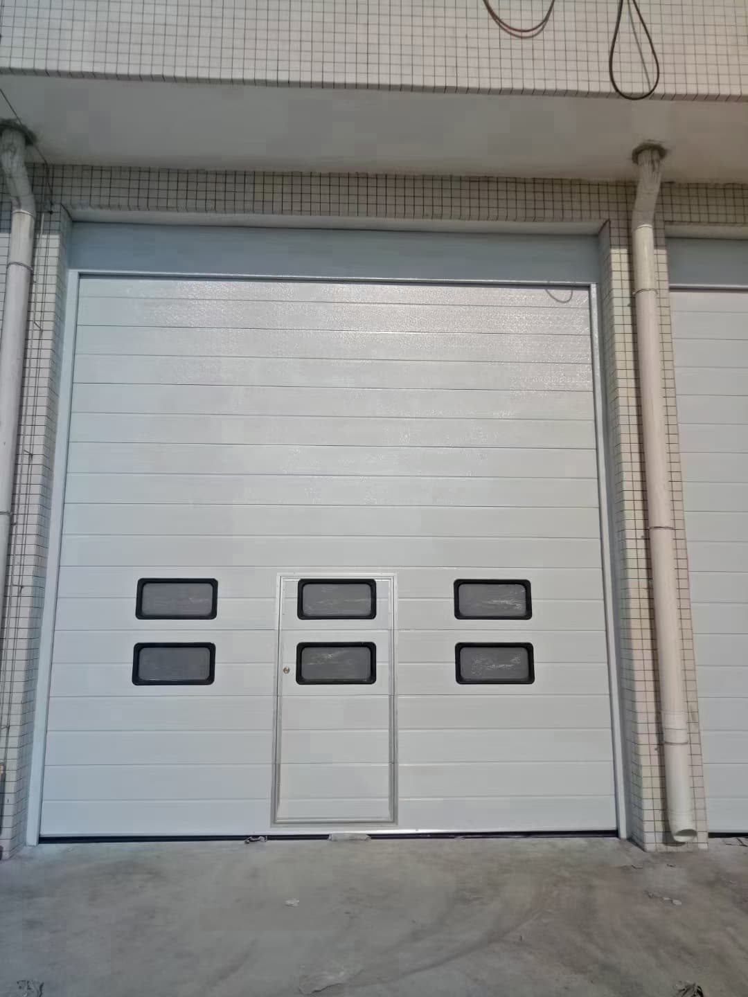 哪家工业提升门生产厂好?广杰门窗品质保障 哪家工业提升门生产厂好?广杰门窗品质保障